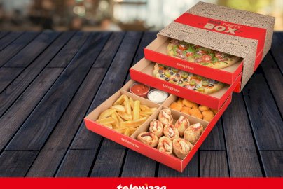 Powiększ obraz: fot. www.telepizza.pl/lokale/Legionowo/Reymonta. Na zdjęciu mega party box: pizze, sosy, frytki